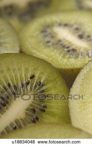 Kiwi fruit, close-up View Large Photo Image Stock Photo - Kiwi fruit, close-up. Fotosearch