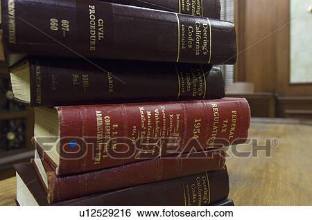 Legal books in court room View Large Photo Image Stock Photograph - Legal books in court room. Fotosearch