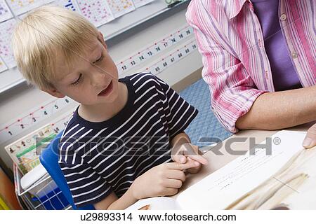Picture - Little Boy Learning. Fotosearch