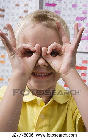 Little Boy Making Binoculars with His Hands View Large Photo Image Stock Photograph - Little Boy Making Binoculars with His Hands. Fotosearch