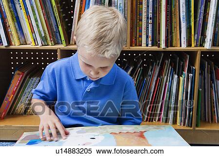 Little Boy Reading a Picture Book View Large Photo Image Stock Photography - Little Boy Reading a Picture Book. Fotosearch