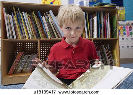 Little Boy Reading Picture Book View Large Photo Image Stock Photo - Little Boy Reading Picture Book. Fotosearch