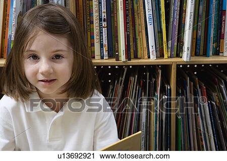 Little Girl Reading in the Library View Large Photo Image Stock Image - Little Girl Reading in the Library. Fotosearch
