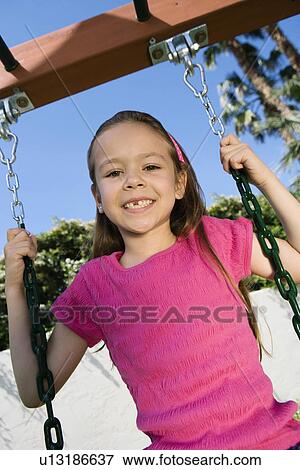 Little Girl Swinging View Large Photo Image Stock Photo - Little Girl Swinging. Fotosearch