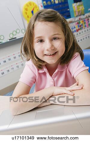 Stock Photo - Little Girl Using a Laptop. Fotosearch