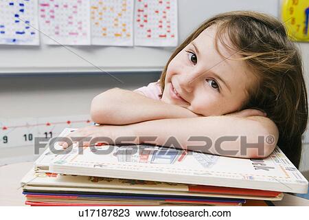 Little Girl with a Stack of Books View Large Photo Image Stock Image - Little Girl with a Stack of Books. Fotosearch