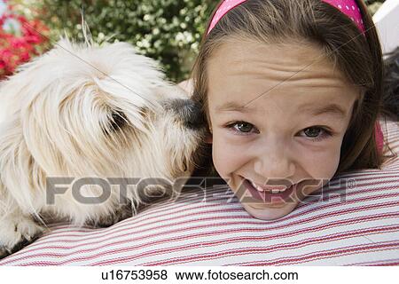 Stock Photo - Little Girl with Her Pet Dog. Fotosearch