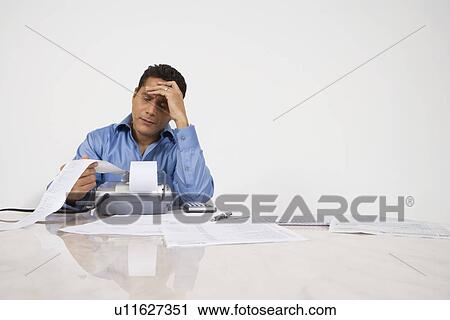 Man Calculating Finances View Large Photo Image Stock Image - Man Calculating Finances. Fotosearch