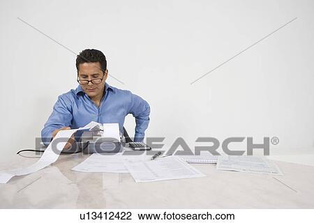 Man Calculating Finances View Large Photo Image Stock Image - Man Calculating Finances. Fotosearch