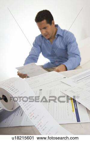 Man Calculating Finances View Large Photo Image Stock Image - Man Calculating Finances. Fotosearch