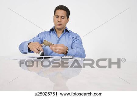 Man Cutting up a Credit Card View Large Photo Image Stock Image - Man Cutting up a Credit Card. Fotosearch