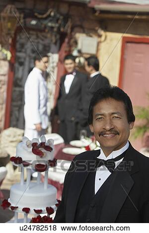 Stock Photo - Man in tuxedo at Quinceanera. Fotosearch