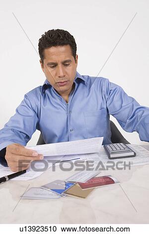 Man Paying Bills View Large Photo Image Stock Image - Man Paying Bills. Fotosearch