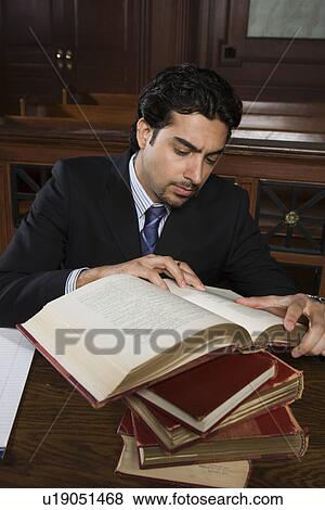 Stock Photo - Man reading in court. Fotosearch