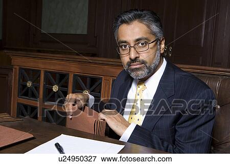 Man sitting in court, portrait View Large Photo Image Stock Photo - Man sitting in court, portrait. Fotosearch