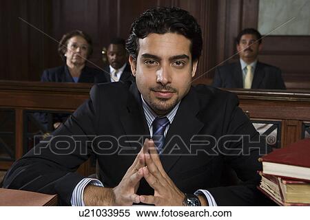 Stock Photography - Man sitting in court, portrait. Fotosearch