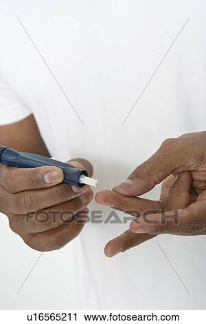 Man taking syringe from protective case, close-up of hands View Large Photo Image Stock Image - Man taking syringe from protective case, close-up of hands. Fotosearch