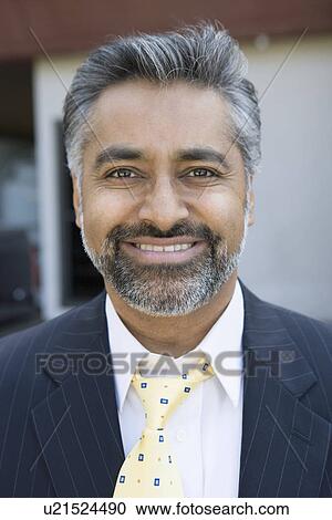 Man wearing suit, outdoors, portrait View Large Photo Image Stock Image - Man wearing suit, outdoors, portrait. Fotosearch