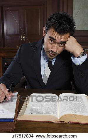 Man working in court, portrait View Large Photo Image Picture - Man working in court, portrait. Fotosearch