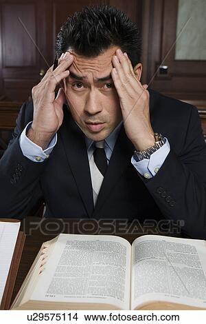 Picture - Man working in court, portrait. Fotosearch