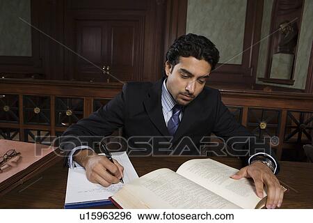 Stock Photograph - Man working in court. Fotosearch