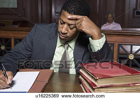Stock Photo - Man writing in court. Fotosearch