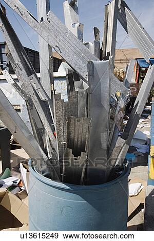 Metal parts in barrel View Large Photo Image Stock Photo - Metal parts in barrel. Fotosearch