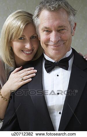 Stock Image - Middle-aged couple, portrait. Fotosearch