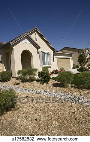 Stock Image - New House With Landscaped Yard. Fotosearch