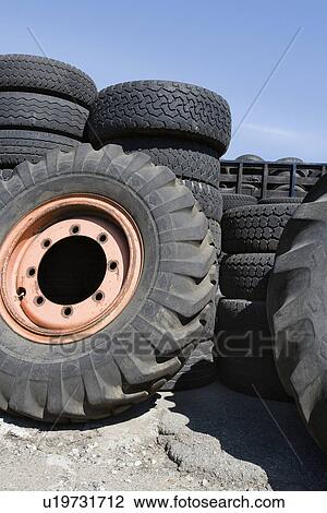 Old tires in recycling centre View Large Photo Image Stock Image - Old tires in recycling centre. Fotosearch