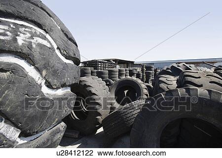 Old tires in recycling centre View Large Photo Image Stock Image - Old tires in recycling centre. Fotosearch