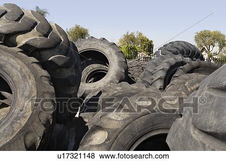 Old tires in recycling centre View Large Photo Image Stock Photo - Old tires in recycling centre. Fotosearch