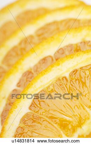 Orange slices, close-up View Large Photo Image Picture - Orange slices, close-up. Fotosearch