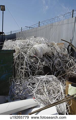 Stock Photo - Pile of cables in recycling centre. Fotosearch