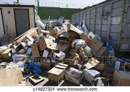 Picture - Pile of cardboard boxes in recycling centre. Fotosearch