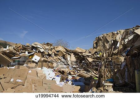 Picture - Pile of cardboard boxes in recycling centre. Fotosearch
