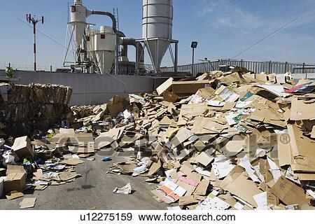 Pile of cardboard boxes in recycling centre View Large Photo Image Stock Photo - Pile of cardboard boxes in recycling centre. Fotosearch