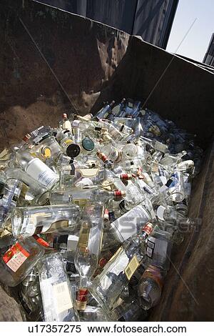 Stock Photography - Pile of glass bottles in bin. Fotosearch