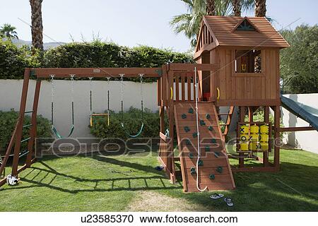 Stock Image - Play Equipment in Backyard. Fotosearch