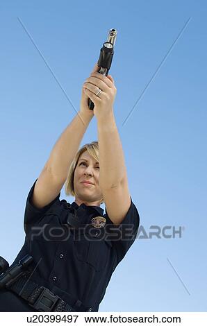Police Officer Aiming Pistol View Large Photo Image Stock Photo - Police Officer Aiming Pistol. Fotosearch
