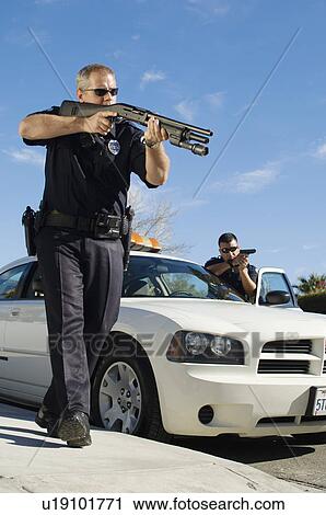 Police Officer Aiming Shotgun View Large Photo Image Stock Image - Police Officer Aiming Shotgun. Fotosearch
