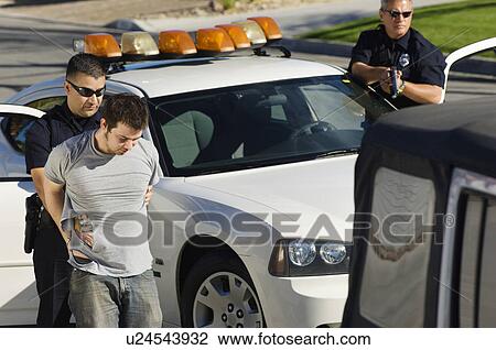 Police Officer Arresting Young Man View Large Photo Image Stock Image - Police Officer Arresting Young Man. Fotosearch