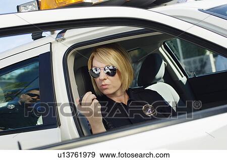 Police Officer Using Two-Way Radio View Large Photo Image Stock Photo - Police Officer Using Two-Way Radio. Fotosearch