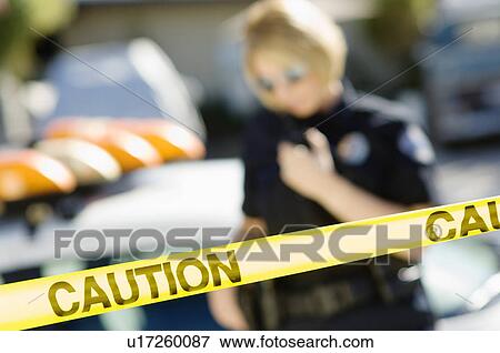 Police Officer Using Two-Way Radio View Large Photo Image Stock Photo - Police Officer Using Two-Way Radio. Fotosearch