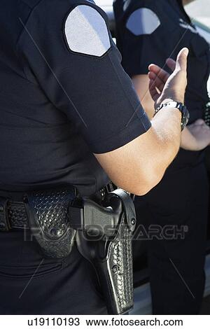 Police Officer with Automatic Pistol View Large Photo Image Stock Image - Police Officer with Automatic Pistol. Fotosearch