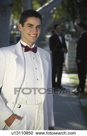 Portrait of boy (13-15) in tuxedo at Quinceanera View Large Photo Image Stock Image - Portrait of boy (13-15) in tuxedo at Quinceanera. Fotosearch