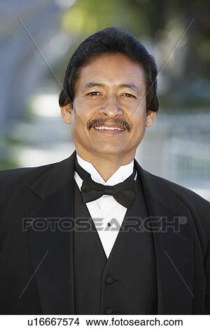 Portrait of man in tuxedo at Quinceanera View Large Photo Image Picture - Portrait of man in tuxedo at Quinceanera. Fotosearch