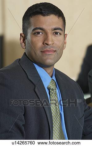 Stock Image - Portrait of mid adult business man. Fotosearch