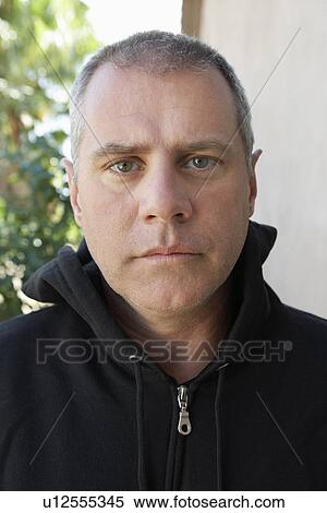 Portrait of mid adult man outside house View Large Photo Image Stock Photography - Portrait of mid adult man outside house. Fotosearch