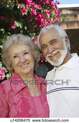 Stock Image - Portrait of senior couple outdoors. Fotosearch
